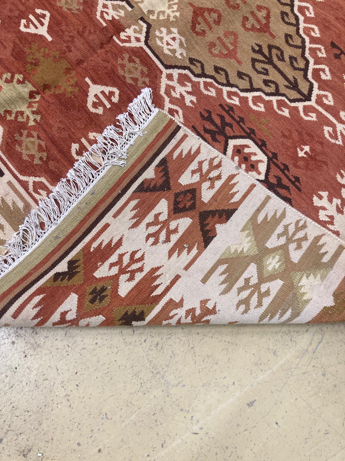 A geometric Kilim rug, 240 x 167cm